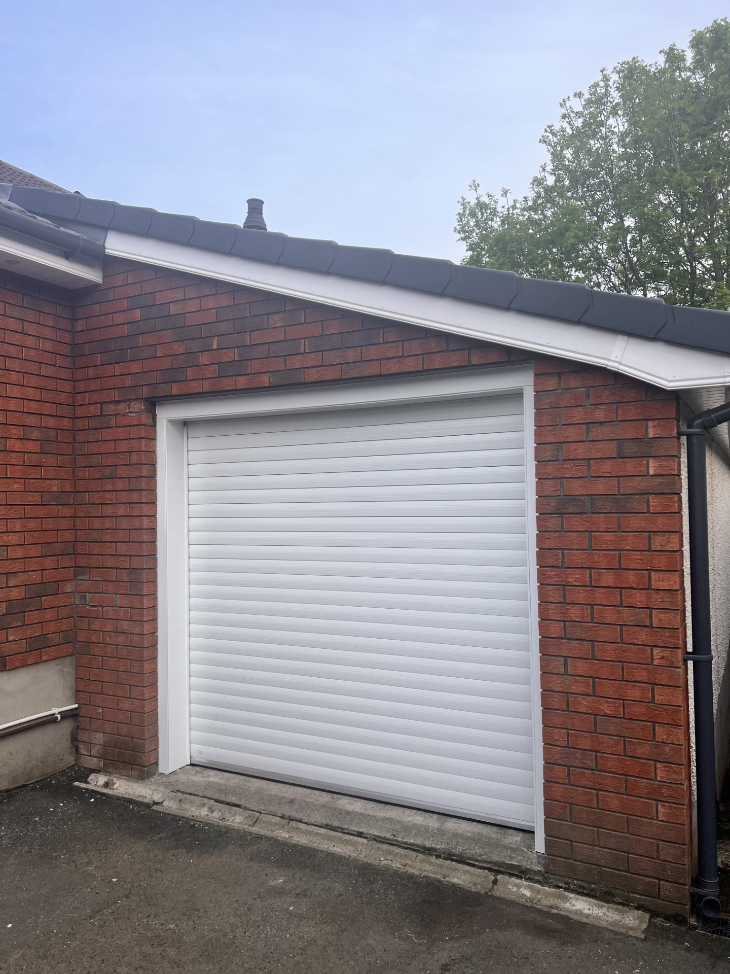 White roller garage door with new fascia